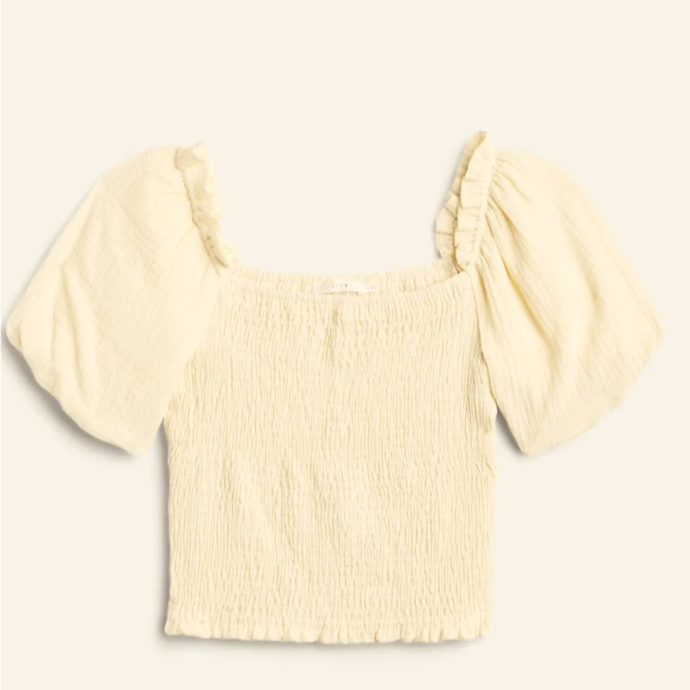 Wear on or off shoulder Off White/light cream color. Stretchy softcotton fabric